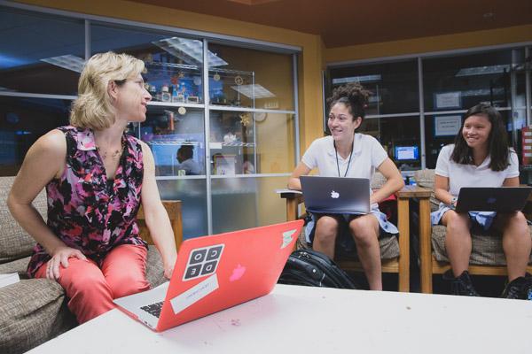 Computer Science & Engineering Department Chair and teacher Ann Greyson teaches a small-group Upper School coding class.